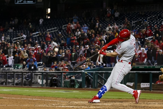 Philadelphia Phillies' Bryce Harper hits a two-run homer during the eighth inning of a baseball game against the Washington Nationals at Nationals Park, Tuesday, April 2, 2019, in Washington. The Phillies won 8-2. (AP Photo/Alex Brandon)