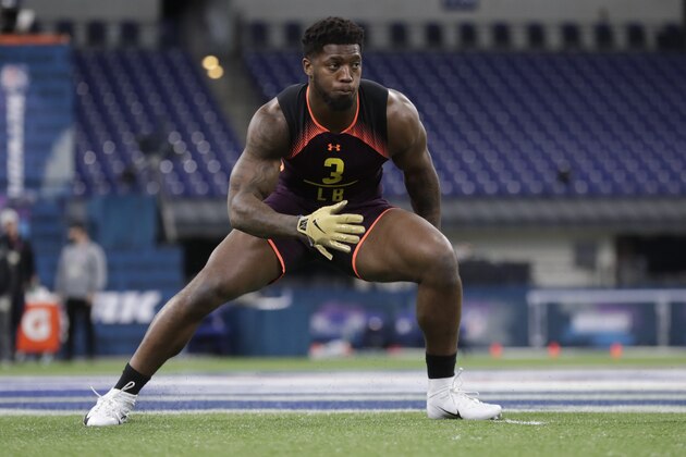 Kentucky linebacker Josh Allen runs a drill at the NFL football scouting combine in Indianapolis, Sunday, March 3, 2019. (AP Photo/Michael Conroy)
