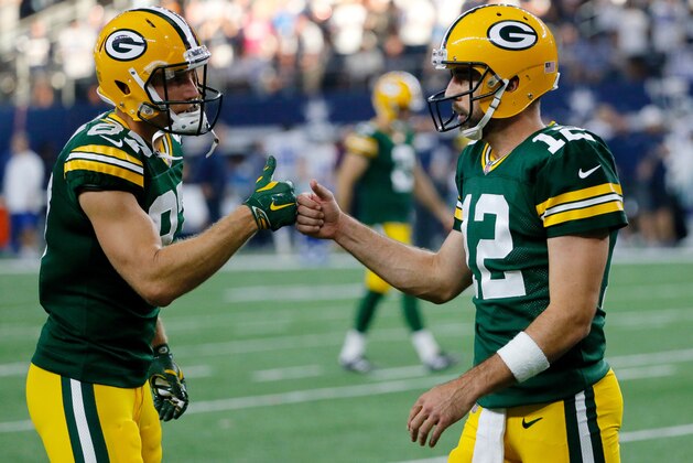 FILE - In this Oct. 8, 2017, file photo, Green Bay Packers' Jordy Nelson (87) and Aaron Rodgers (12) celebrate a touchdown late in the second half of an NFL football game against the Dallas Cowboys in Arlington, Texas. An offseason of change for the Packers has been met with occasional displeasure by Rodgers.  (AP Photo/Roger Steinman, File)