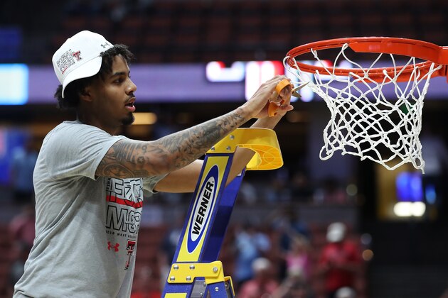 ANAHEIM, CALIFORNIA - MARCH 30: Kyler Edwards #0 of the Texas Tech Red Raiders cuts the net after defeating the Gonzaga Bulldogs during the 2019 NCAA Men's Basketball Tournament West Regional at Honda Center on March 30, 2019 in Anaheim, California. (Photo by Sean M. Haffey/Getty Images)