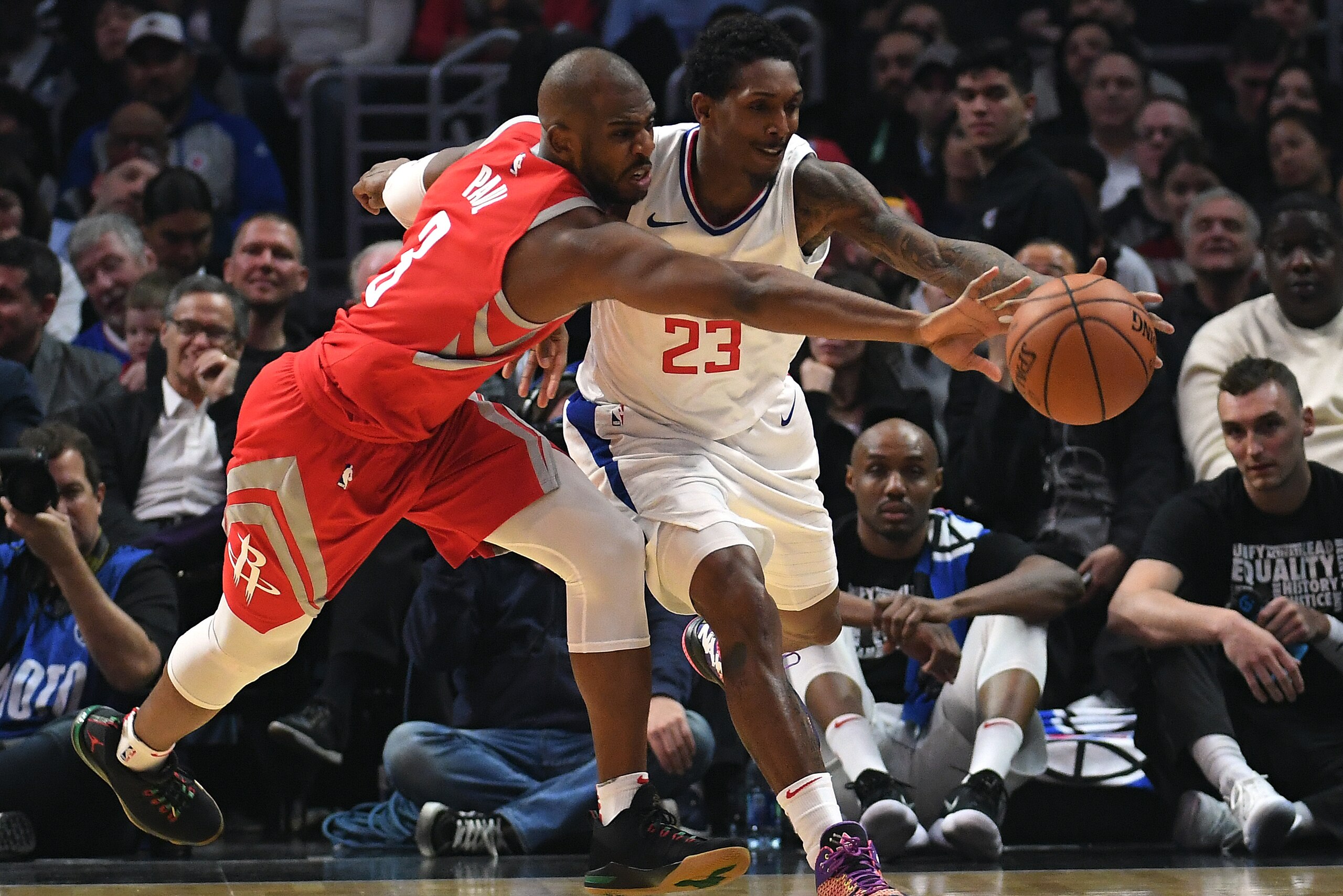LOS ANGELES, CA - FEBRUARY 28: Chris Paul #3 of the Houston Rockets attempts to steal the ball from Lou Williams #23 of the Los Angeles Clippers during the first half at Staples Center on February 28, 2018 in Los Angeles, California. NOTE TO USER: User expressly acknowledges and agrees that, by downloading and or using this photograph, User is consenting to the terms and conditions of the Getty Images License Agreement. (Photo by Kevork Djansezian/Getty Images)