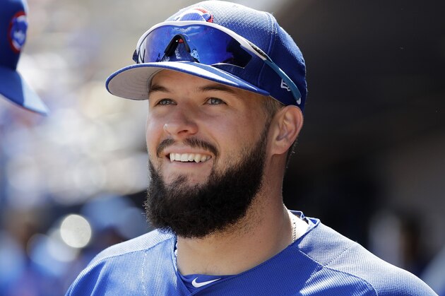 Chicago Cubs' David Bote stands in the dugout during a spring training baseball game Sunday, March 24, 2019, in Peoria, Ariz. (AP Photo/Elaine Thompson)
