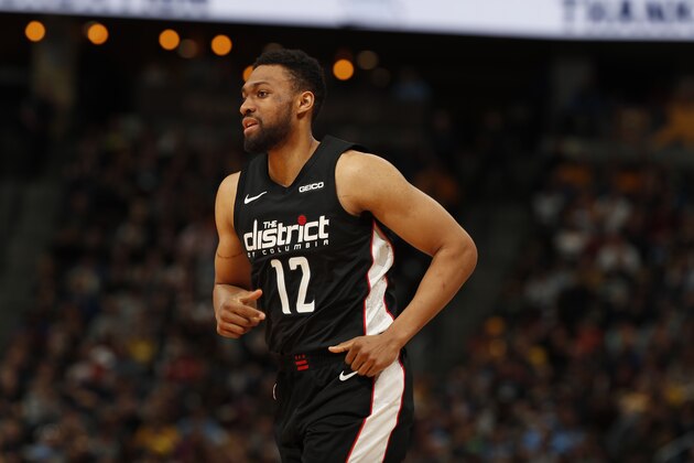 Washington Wizards forward Jabari Parker (12) in the second half of an NBA basketball game Sunday, March 31, 2019, in Denver. The Wizards won 95-90. (AP Photo/David Zalubowski)