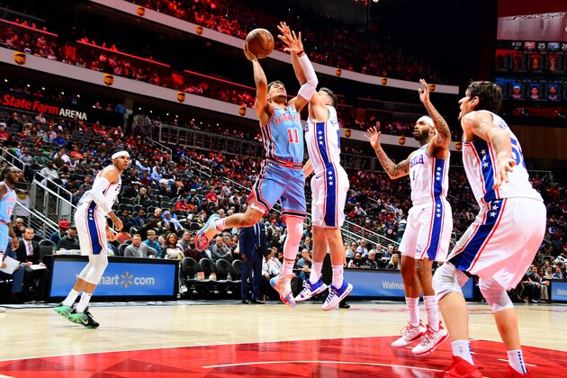 ATLANTA, GA - APRIL  3: Trae Young #11 of the Atlanta Hawks shoots the ball against the Philadelphia 76ers on April 3, 2019 at State Farm Arena in Atlanta, Georgia.  NOTE TO USER: User expressly acknowledges and agrees that, by downloading and/or using this Photograph, user is consenting to the terms and conditions of the Getty Images License Agreement. Mandatory Copyright Notice: Copyright 2019 NBAE (Photo by Scott Cunningham/NBAE via Getty Images)