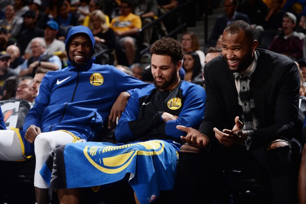 DENVER, CO - OCTOBER 21: Kevin Durant #35, Klay Thompson #11, and DeMarcus Cousins #0 of the Golden State Warriors react to a play during the game against the Denver Nuggets on October 21, 2018 at the Pepsi Center in Denver, Colorado. NOTE TO USER: User expressly acknowledges and agrees that, by downloading and/or using this photograph, user is consenting to the terms and conditions of the Getty Images License Agreement. Mandatory Copyright Notice: Copyright 2018 NBAE (Photo by Bart Young/NBAE via Getty Images)