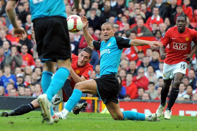 Manchester United's Federico Macheda (C) scores the third and winning goal during the English Premiership football match against Aston Villa'at Old Trafford, Manchester, north-west England, on April 5, 2009. AFP PHOTO/ANDREW YATES.  FOR EDITORIAL USE ONLY Additional licence required for any commercial/promotional use or use on TV or internet (except identical online version of newspaper) of Premier League/Football League photos. Tel DataCo +44 207 2981656. Do not alter/modify photo. (Photo credit should read ANDREW YATES/AFP/Getty Images)