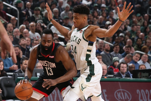 MILWAUKEE, WI - MARCH 26: James Harden #13 of the Houston Rockets handles the ball against Giannis Antetokounmpo #34 of the Milwaukee Bucks on March 26, 2019 at the Fiserv Forum in Milwaukee, Wisconsin. NOTE TO USER: User expressly acknowledges and agrees that, by downloading and or using this photograph, user is consenting to the terms and conditions of the Getty Images License Agreement. Mandatory Copyright Notice: Copyright 2019 NBAE (Photo by Gary Dineen/NBAE via Getty Images)