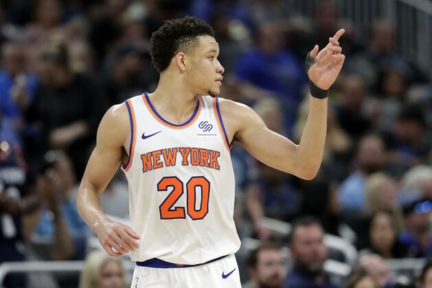 New York Knicks' Kevin Knox points after making a 3-point shot against the Orlando Magic during the second half of an NBA basketball game, Wednesday, April 3, 2019, in Orlando, Fla. (AP Photo/John Raoux)
