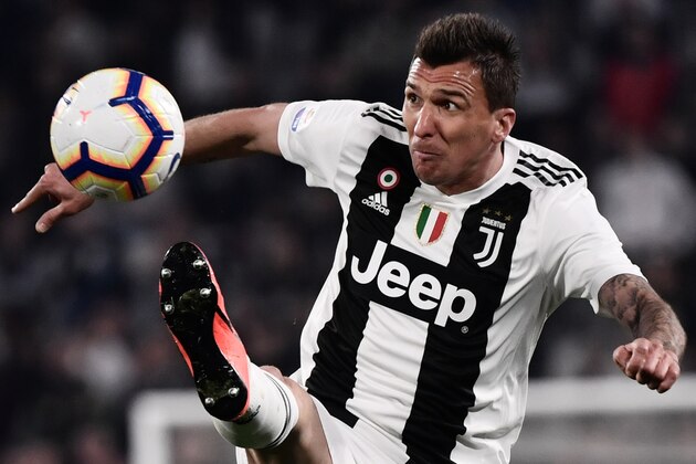 TOPSHOT - Juventus' Croatian forward Mario Mandzukic controls the ball during the Italian Serie A football match Juventus vs Empoli on March 30, 2019 at the Juventus stadium in Turin. (Photo by Marco BERTORELLO / AFP)        (Photo credit should read MARCO BERTORELLO/AFP/Getty Images)