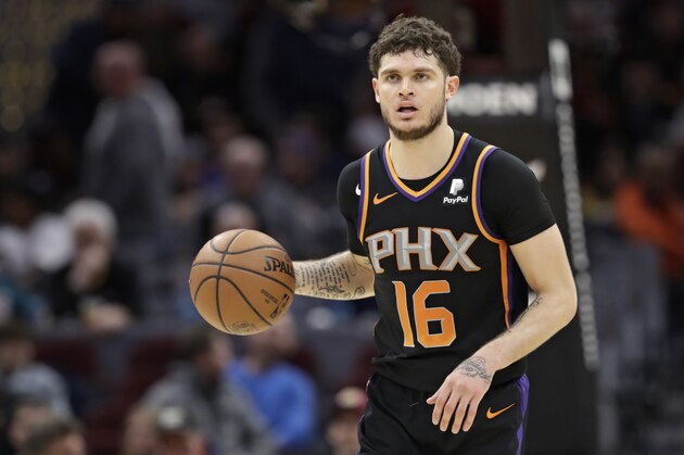 Phoenix Suns' Tyler Johnson drives against the Cleveland Cavaliers in the second half of an NBA basketball game, Thursday, Feb. 21, 2019, in Cleveland. (AP Photo/Tony Dejak)