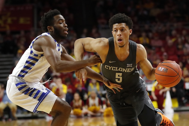 Iowa State guard Lindell Wigginton (5) drives to the basket past Eastern Illinois guard Kashawn Charles during the first half of an NCAA college basketball game Friday, Dec. 21, 2018, in Ames, Iowa. (AP Photo/Charlie Neibergall)