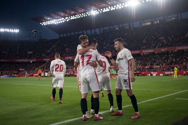 Sevilla's Spanish midfielder Pablo Sarabia is congratulated by teammates for his goal during the Spanish league football match between Sevilla FC and Deportivo Alaves at the Ramon Sanchez Pizjuan stadium in Seville on April 4, 2019. (Photo by JORGE GUERRERO / AFP)        (Photo credit should read JORGE GUERRERO/AFP/Getty Images)