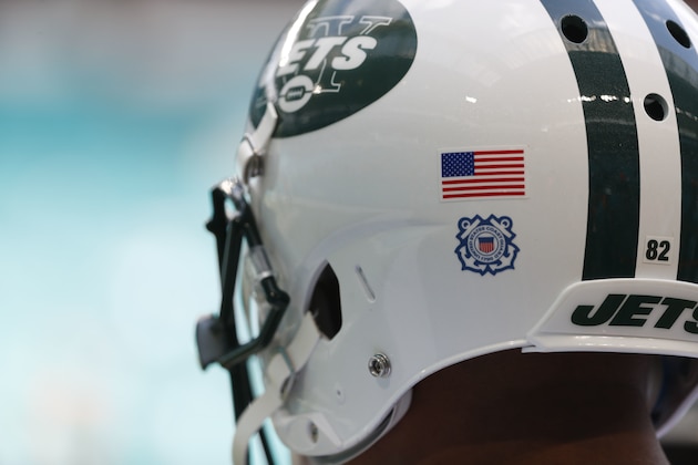 New York Jets wide receiver Rishard Matthews (82) wears Salute to Service logo on his helmet before an NFL football game between the Miami Dolphins and the New York Jets, Sunday, Nov. 4, 2018, in Miami Gardens, Fla. (AP Photo/Wilfredo Lee)