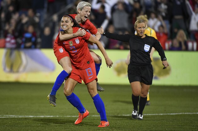 COMMERCE CITY, CO - APRIL 4: Alex Morgan #13 of the United States celebrates with Megan Rapinoe #15 after scoring her 100th international goal against Australia at Dick's Sporting Goods Park on April 4, 2019 in Commerce City, Colorado. (Photo by Michael Ciaglo/Getty Images)