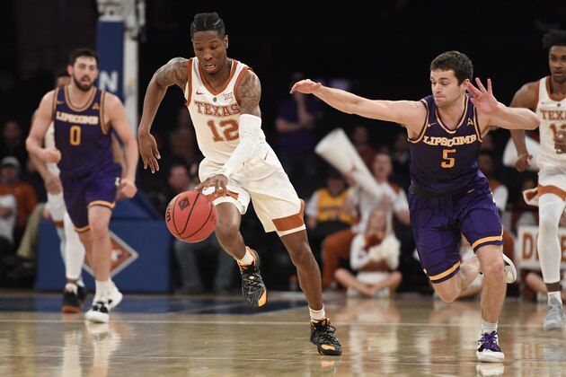 NEW YORK, NEW YORK - APRIL 04: Kerwin Roach II #12 of the Texas Longhorns dribbles the ball during the first half of the game against the Lipscomb Bisons at Madison Square Garden on April 04, 2019 in New York City. (Photo by Sarah Stier/Getty Images)