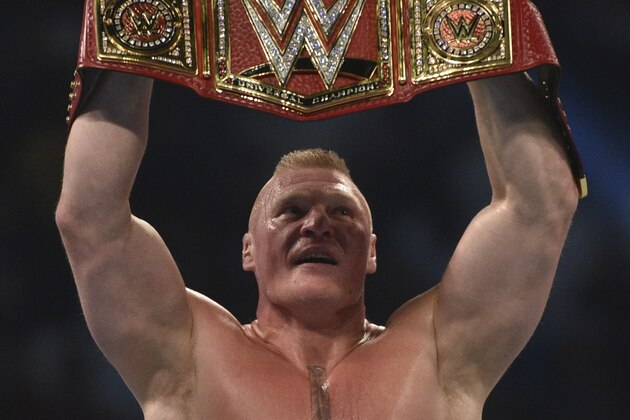 Brock Lesnar celebrates after winning the WWE Universal Championship match as part of as part of the World Wrestling Entertainment (WWE) Crown Jewel pay-per-view at the King Saud University Stadium in Riyadh on November 2, 2018. (Photo by Fayez Nureldine / AFP)        (Photo credit should read FAYEZ NURELDINE/AFP/Getty Images)