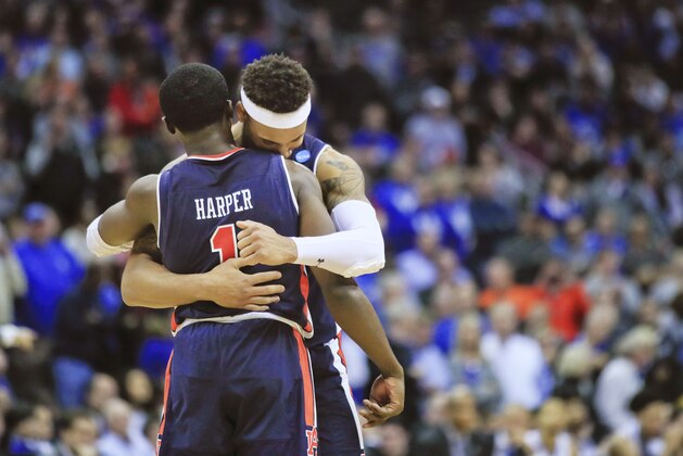 Auburn's Jared Harper (1) and teammate Bryce Brown celebrate near the end of overtime of the Midwest Regional final game against Kentucky in the NCAA men's college basketball tournament Sunday, March 31, 2019, in Kansas City, Mo. Auburn won 77-71 in overtime. (AP Photo/Orlin Wagner)