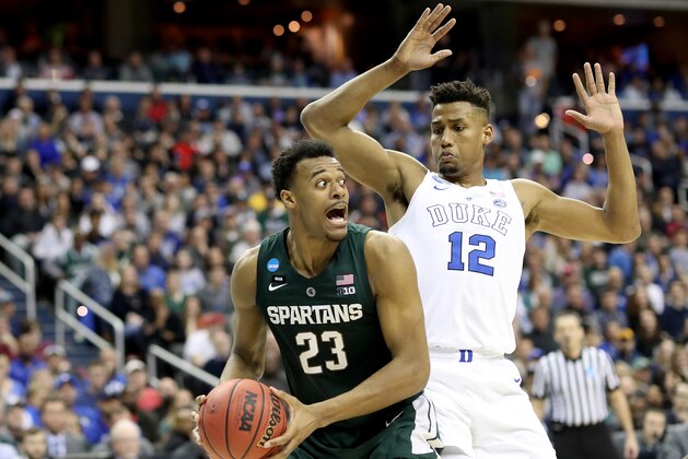 WASHINGTON, DC - MARCH 31: Xavier Tillman #23 of the Michigan State Spartans is defended by Javin DeLaurier #12 of the Duke Blue Devils during the second half in the East Regional game of the 2019 NCAA Men's Basketball Tournament at Capital One Arena on March 31, 2019 in Washington, DC. (Photo by Rob Carr/Getty Images)