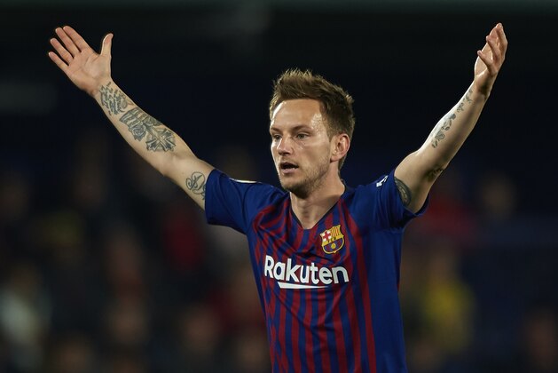 VILLAREAL, SPAIN - APRIL 02: Ivan Rakitic of Barcelona reacts during the La Liga match between Villarreal CF and FC Barcelona at Estadio de la Ceramica on April 02, 2019 in Villareal, Spain. (Photo by Manuel Queimadelos Alonso/Getty Images)
