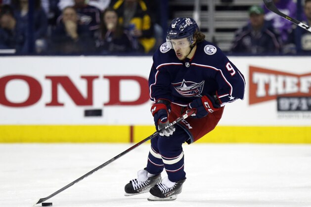 Columbus Blue Jackets forward Artemi Panarin, of Russia, carries the puck against the Boston Bruins during an NHL hockey game in Columbus, Ohio, Tuesday, April 2, 2019. The Bruins won 6-2. (AP Photo/Paul Vernon)