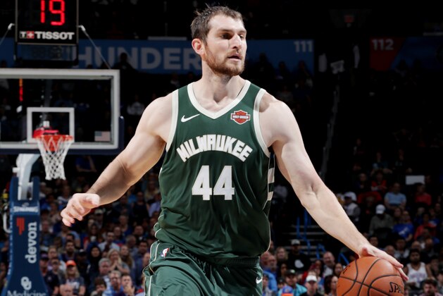 OKLAHOMA CITY, OK - OCTOBER 9:  Tyler Zeller #44 of the Milwaukee Bucks handles the ball against the Oklahoma City Thunder during a pre-season game on October 9, 2018 at Chesapeake Energy Arena in Oklahoma City, Oklahoma. NOTE TO USER: User expressly acknowledges and agrees that, by downloading and/or using this photograph, user is consenting to the terms and conditions of the Getty Images License Agreement. Mandatory Copyright Notice: Copyright 2018 NBAE (Photo by Zach Beeker/NBAE via Getty Images)