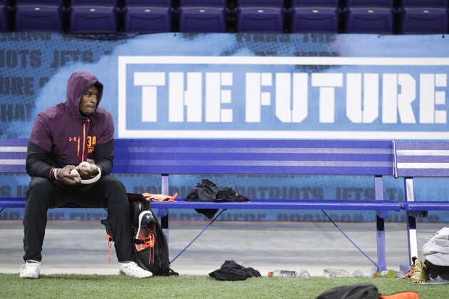 Mississippi wide receiver D.K. Metcalf sits on the bench between drills at the NFL football scouting combine in Indianapolis, Saturday, March 2, 2019. (AP Photo/Michael Conroy)