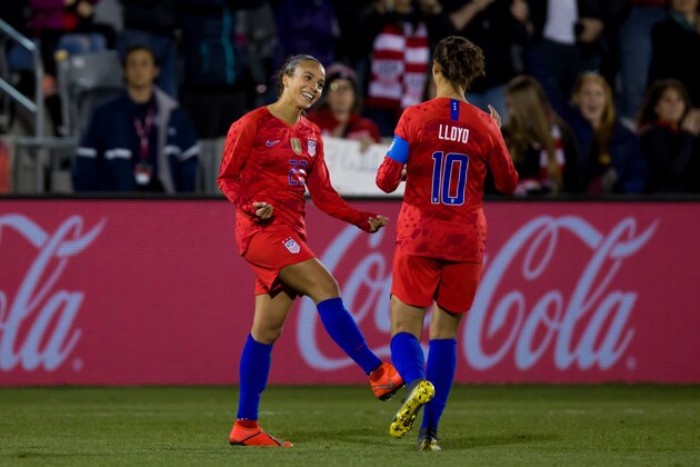 COMMERCE CITY, CO - APRIL 4:  Mallory Pugh #22 of the United States celebrates her second goal of the game with Carli Lloyd #10 during the second half of an international friendly at Dick's Sporting Goods Park on April 4, 2019 in Commerce City, Colorado. The United States defeated Australia 5-3. (Photo by Justin Edmonds/Getty Images)