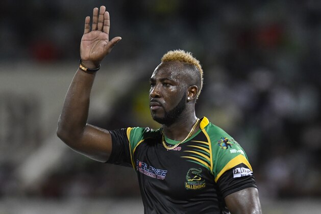 PROVIDENCE, GUYANA - SEPTEMBER 12: In this handout image provided by CPL T20, Andre Russell of Jamaica Tallawahs celebrates the dismissal of Fabian Allen of St Kitts & Nevis Patriots during the Hero Caribbean Premier League Play-Off match 32 between St Kitts & Nevis Patriots and Jamaica Tallawahs at Guyana National Stadium on September 12, 2018 in Providence, Guyana (Photo by Randy Brooks - CPL T20/Getty Images)