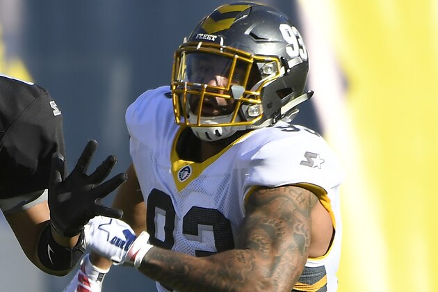 SAN DIEGO, CALIFORNIA - MARCH 17: Keith Price #8 of the Birmingham Iron throws a pass as he is pursued by Alex Barrett #93 of the San Diego Fleet during the first half in an Alliance of American Football game at SDCCU Stadium on March 17, 2019 in San Diego, California. (Photo by John McCoy/AAF/Getty Images)