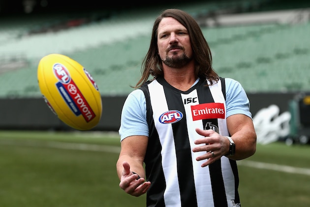 MELBOURNE, AUSTRALIA - JUNE 24: Smackdown women's champion Carmella and WWE'S world champion AJ Styles show their football skills at the Melbourne Cricket Ground on June 24, 2018 in Melbourne, Australia. (Photo by Robert Prezioso/Getty Images)