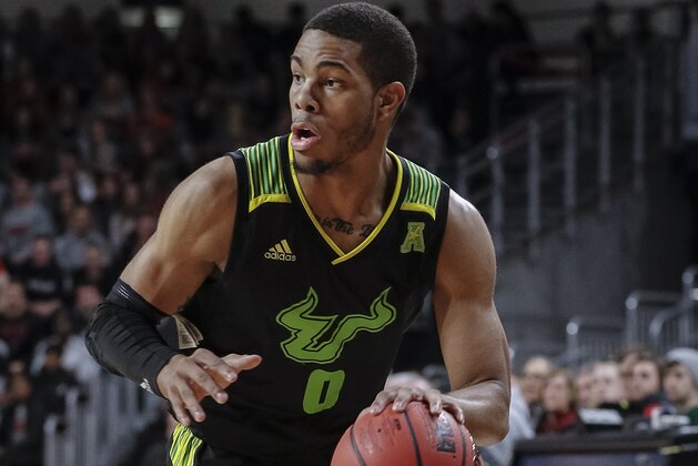 CINCINNATI, OH - JANUARY 15: David Collins #0 of the South Florida Bulls brings the ball up court during the game against the Cincinnati Bearcats at Fifth Third Arena on January 15, 2019 in Cincinnati, Ohio. (Photo by Michael Hickey/Getty Images)