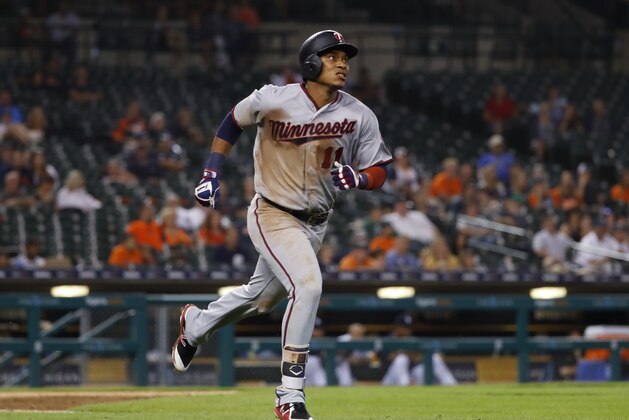 Minnesota Twins' Jorge Polanco watches his solo home run in the ninth inning of a baseball game against the Detroit Tigers in Detroit, Monday, Sept. 17, 2018. (AP Photo/Paul Sancya)