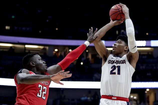 Gonzaga forward Rui Hachimura, right, shoots over Texas Tech center Norense Odiase during the first half of the West Regional final in the NCAA men's college basketball tournament Saturday, March 30, 2019, in Anaheim, Calif. (AP Photo/Jae C. Hong)