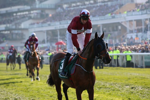 LIVERPOOL, ENGLAND - APRIL 06:  Daryl Russell riding Tiger Roll makes his way to the start  prior to the Randox Health Grand National Handicap Chase at Aintree Racecourse on April 06, 2019 in Liverpool, England. (Photo by Alex Livesey/Getty Images)