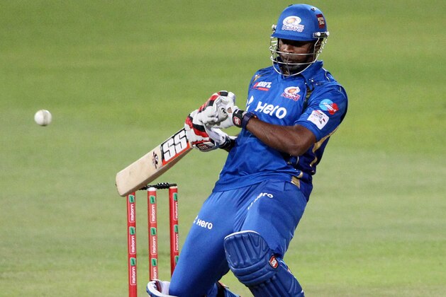 Kieron Pollard of the Mumbai Indians bats on October 22, 2012 during a Champions League T20 (CLT20) match Sydney Sixers vs Mumbai Indians at Sahara Stadium Kingsmead in Durban. AFP PHOTO / STR        (Photo credit should read -/AFP/Getty Images)