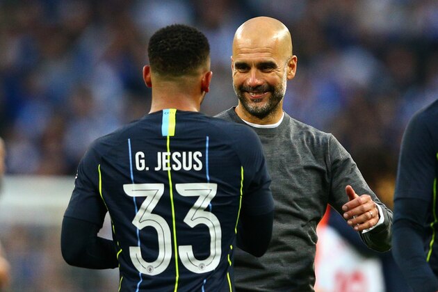 LONDON, ENGLAND - APRIL 06: Manchester City manager Josep Guardiola celebrates with Gabriel Jesus of Manchester City after the FA Cup Semi Final match between Manchester City  and Brighton and Hove Albion at Wembley Stadium on April 6, 2019 in London, England. (Photo by Craig Mercer/MB Media/Getty Images)