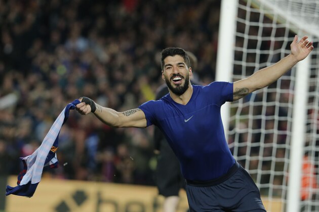 Barcelona's Uruguayan forward Luis Suarez celebrates his goal during the Spanish league football match between FC Barcelona and Club Atletico de Madrid at the Camp Nou stadium in Barcelona on April 6, 2019. (Photo by PAU BARRENA / AFP)        (Photo credit should read PAU BARRENA/AFP/Getty Images)