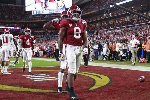 Alabama running back Josh Jacobs (8) celebrates his touchdown, during the first half of the Orange Bowl NCAA college football game against Oklahoma , Saturday, Dec. 29, 2018, in Miami Gardens, Fla. (AP Photo/Wilfredo Lee)