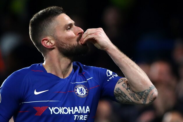 LONDON, ENGLAND - APRIL 03: Olivier Giroud of Chelsea FC celebrates scoring his teams first goal during the Premier League match between Chelsea FC and Brighton & Hove Albion at Stamford Bridge on April 03, 2019 in London, United Kingdom. (Photo by Chloe Knott - Danehouse/Getty Images)