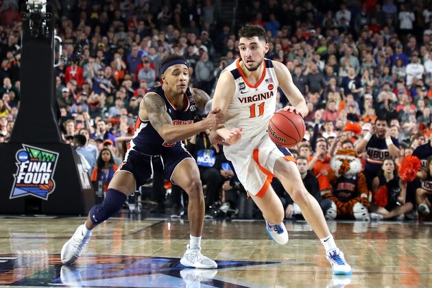 MINNEAPOLIS, MINNESOTA - APRIL 06: Ty Jerome #11 of the Virginia Cavaliers dribbles against Bryce Brown #2 of the Auburn Tigers in the second half during the 2019 NCAA Final Four semifinal at U.S. Bank Stadium on April 6, 2019 in Minneapolis, Minnesota. (Photo by Streeter Lecka/Getty Images)