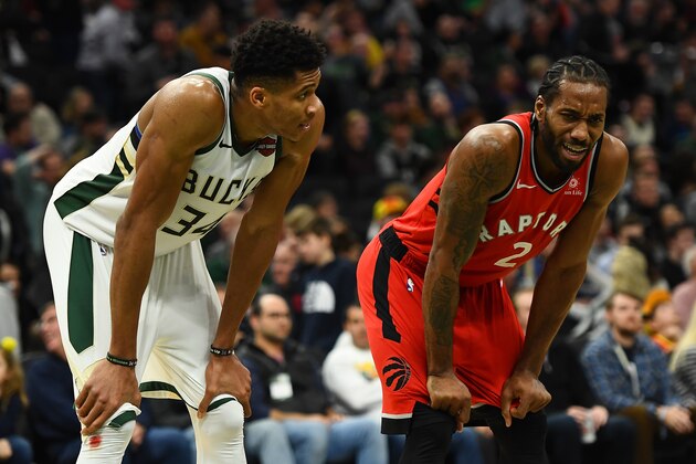 MILWAUKEE, WISCONSIN - JANUARY 05:  Giannis Antetokounmpo #34 of the Milwaukee Bucks and Kawhi Leonard #2 of the Toronto Raptors wait for a free throw during a game at Fiserv Forum on January 05, 2019 in Milwaukee, Wisconsin.  NOTE TO USER: User expressly acknowledges and agrees that, by downloading and or using this photograph, User is consenting to the terms and conditions of the Getty Images License Agreement. (Photo by Stacy Revere/Getty Images)