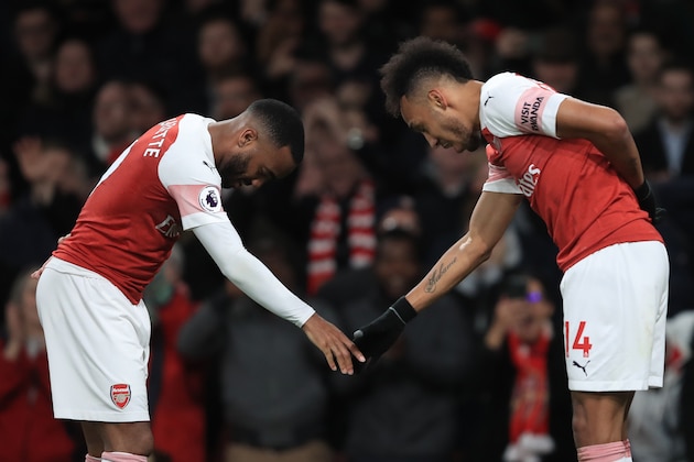 LONDON, ENGLAND - APRIL 01:  Alexandre Lacazette of Arsenal celebrates scoring their 2nd goal with Pierre-Emerick Aubameyang during the Premier League match between Arsenal FC and Newcastle United at Emirates Stadium on April 1, 2019 in London, United Kingdom. (Photo by Marc Atkins/Getty Images)