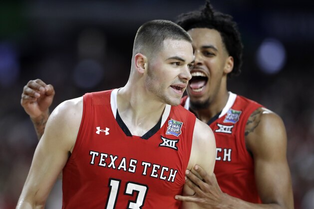 Texas Tech guard Matt Mooney (13) celebrates after making a three-point basket during the second half against Michigan State in the semifinals of the Final Four NCAA college basketball tournament, Saturday, April 6, 2019, in Minneapolis. (AP Photo/Jeff Roberson)