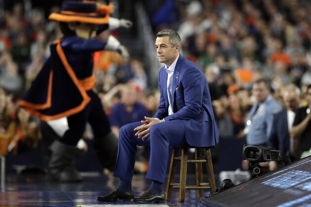 Virginia head coach Tony Bennett watches his team during the first half in the semifinals of the Final Four NCAA college basketball tournament against Auburn, Saturday, April 6, 2019, in Minneapolis. (AP Photo/Jeff Roberson)