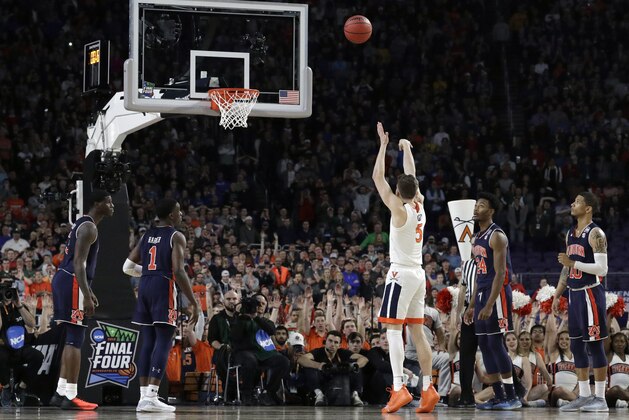Virginia's Kyle Guy (5) shoots the last free throw to defeat Auburn 63-62 during the second half in the semifinals of the Final Four NCAA college basketball tournament, Saturday, April 6, 2019, in Minneapolis. (AP Photo/David J. Phillip)