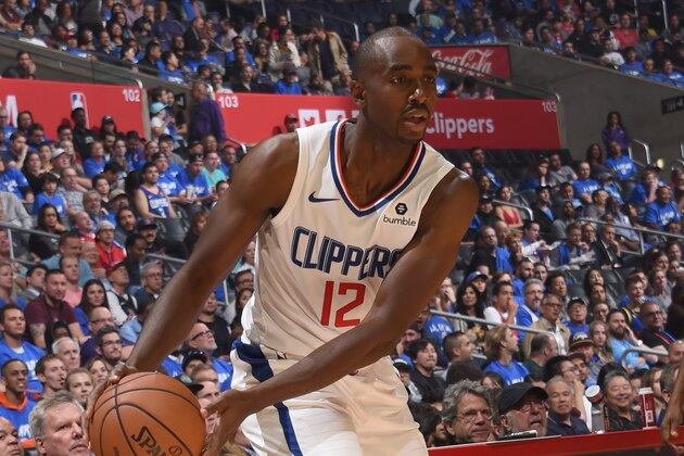 LOS ANGELES, CA - OCTOBER 17: Luc Mbah a Moute #12 of the LA Clippers handles the ball against the Denver Nuggets during a game on October 17, 2018 at Staples Center, in Los Angeles, California. NOTE TO USER: User expressly acknowledges and agrees that, by downloading and/or using this Photograph, user is consenting to the terms and conditions of the Getty Images License Agreement. Mandatory Copyright Notice: Copyright 2018 NBAE (Photo by Adam Pantozzi/NBAE via Getty Images)