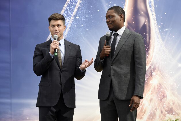 Colin Jost, left, and Michael Che, co-hosts for the 70th Emmy Awards, speak to the media before rolling out the gold carpet outside the Microsoft Theatre, Thursday, Sept. 13, 2018, in Los Angeles. The awards will be held on Monday. (Photo by Chris Pizzello/Invision/AP)