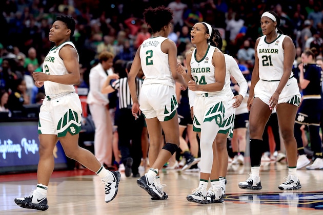 TAMPA, FLORIDA - APRIL 07:  Chloe Jackson #24 of the Baylor Lady Bears celebrates with her teammates after scoring a basket against the Notre Dame Fighting Irish during the fourth quarter in the championship game of the 2019 NCAA Women's Final Four at Amalie Arena on April 07, 2019 in Tampa, Florida. (Photo by Mike Ehrmann/Getty Images)