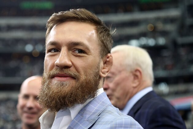 ARLINGTON, TX - OCTOBER 14:  Conor McGregor is seen on the sidelines before the NFL game between the Jacksonville Jaguars and Dallas Cowboys at AT&T Stadium on October 14, 2018 in Arlington, Texas.  (Photo by Ronald Martinez/Getty Images)
