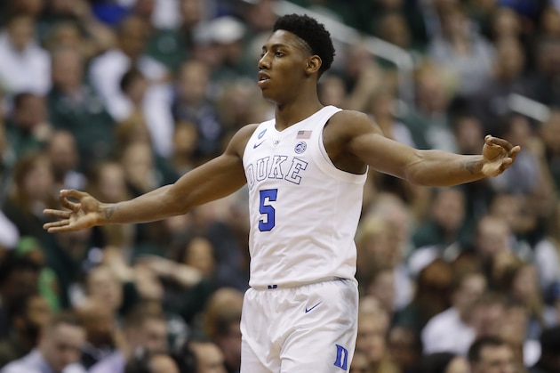 Duke forward RJ Barrett (5) reacts after scoring against Michigan State during the first half of an NCAA men's East Regional final college basketball game in Washington, Sunday, March 31, 2019. (AP Photo/Alex Brandon)